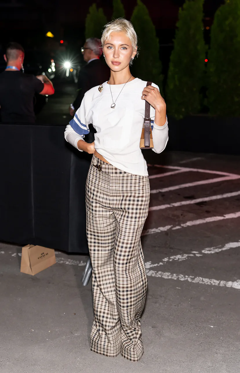 NEW YORK, NEW YORK - SEPTEMBER 09: Iris Law attends the Coach Spring/Summer 2027 fashion show during...