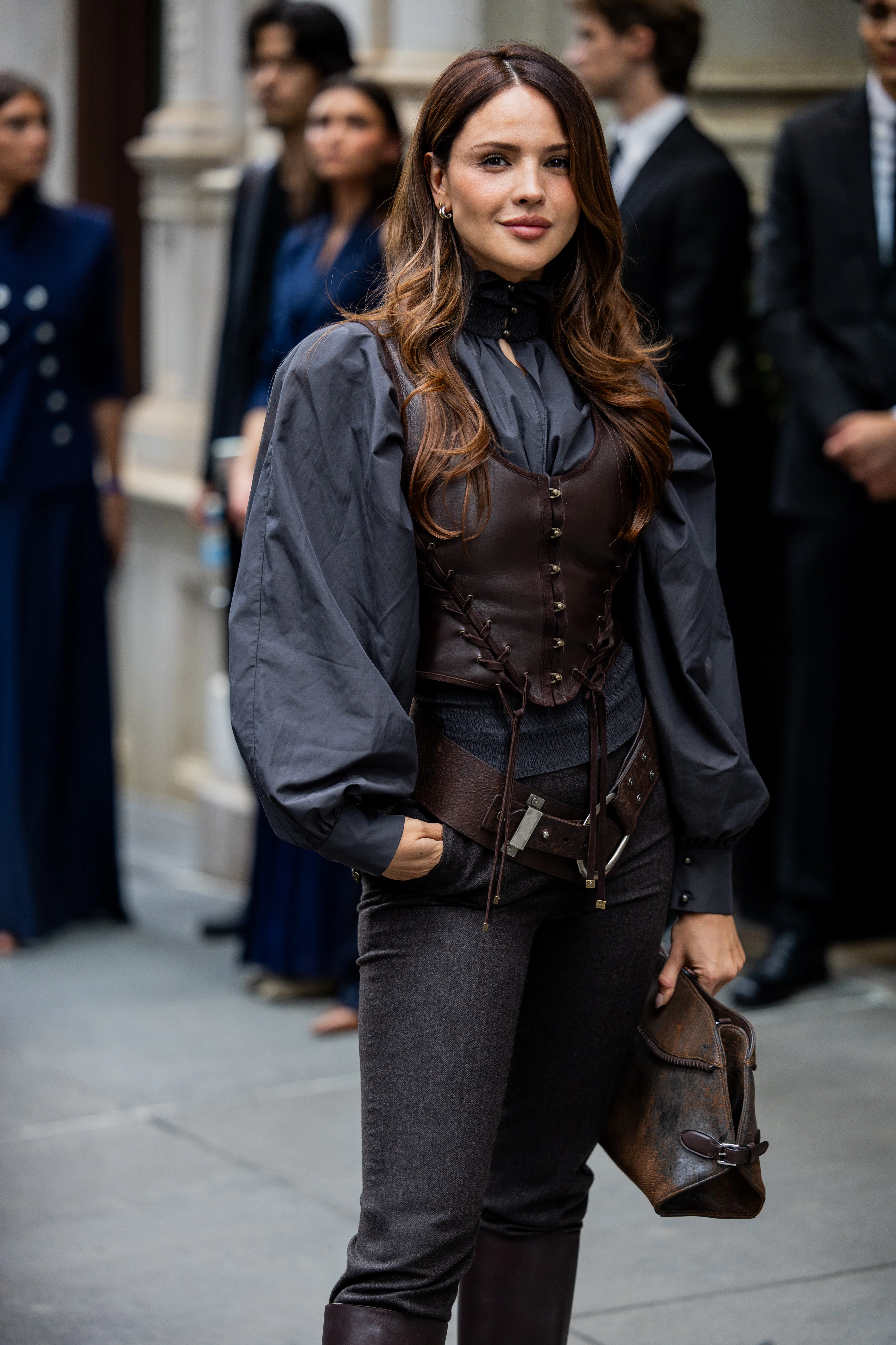 NEW YORK, NEW YORK - SEPTEMBER 09: Eiza González wears grey bluse, black leather vest, belt, pants, ...