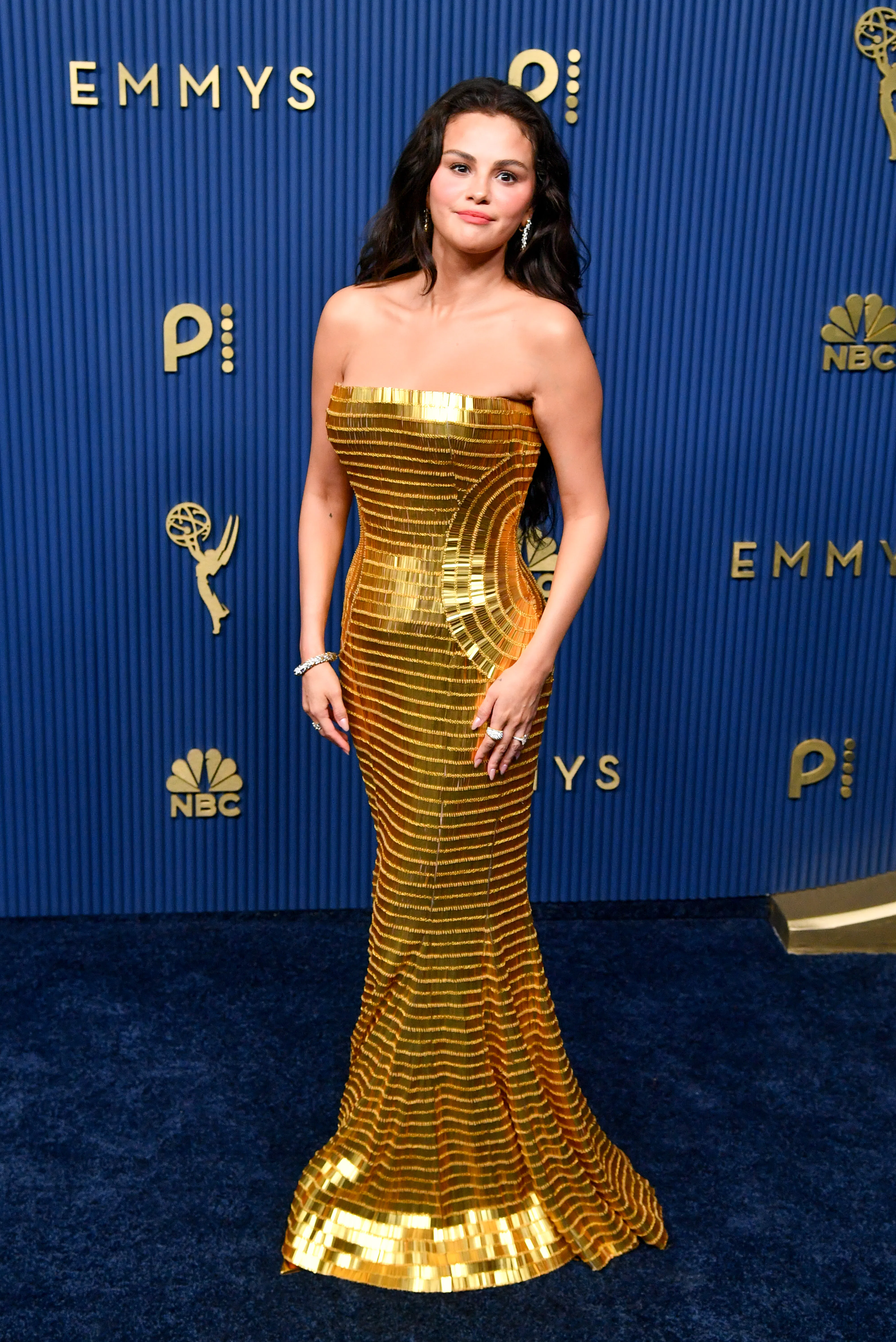 selena gomez gold dress Gomez's 2026 Emmy Awards Is Very 2016-Coded junior homecoming dress