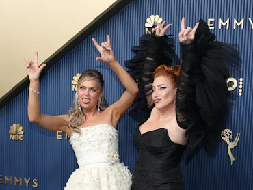 Elaine Hendrix and Lisa Ann Walter walks the red carpet during the 78th Emmy Awards