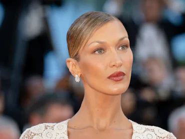 Bella Hadid at the Cannes Film Festival with a slicked-back bun hairstyle