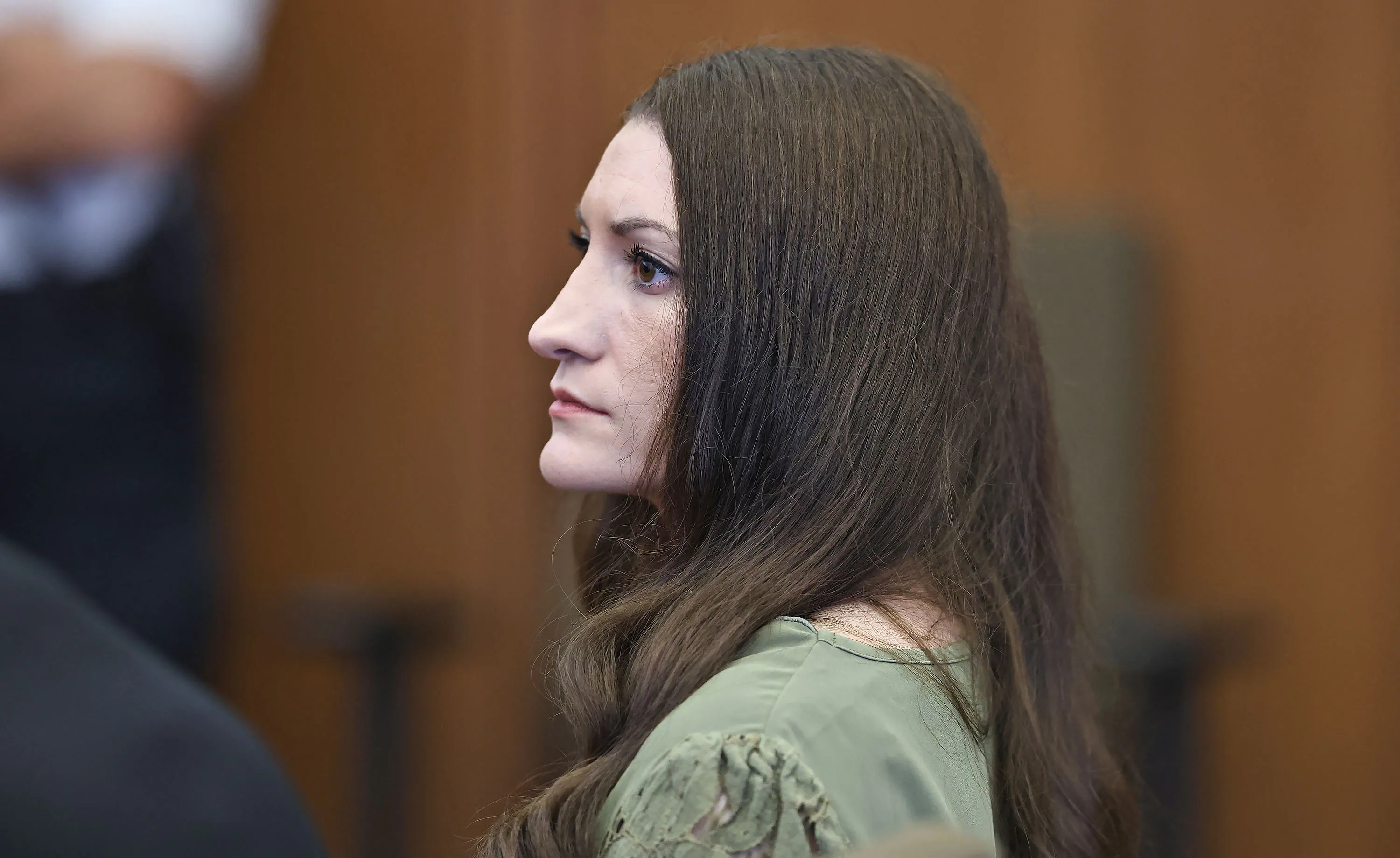 Lindsay Clancy looks on as jurors (out of frame) enter the courtroom during Clancy's murder trial at...