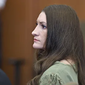 Lindsay Clancy looks on as jurors (out of frame) enter the courtroom during Clancy's murder trial at...