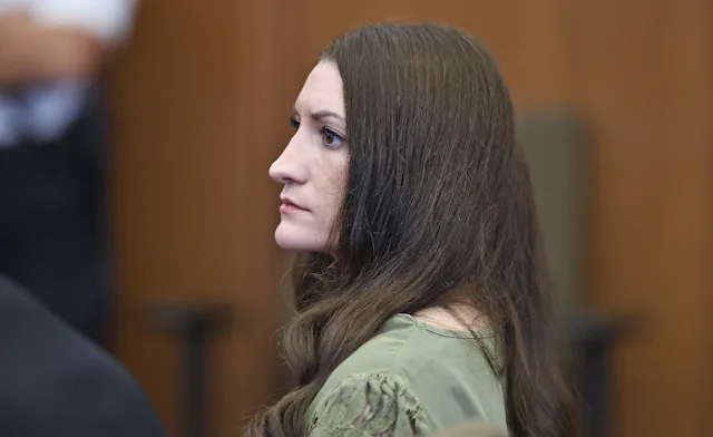 Lindsay Clancy looks on as jurors (out of frame) enter the courtroom during Clancy's murder trial at...