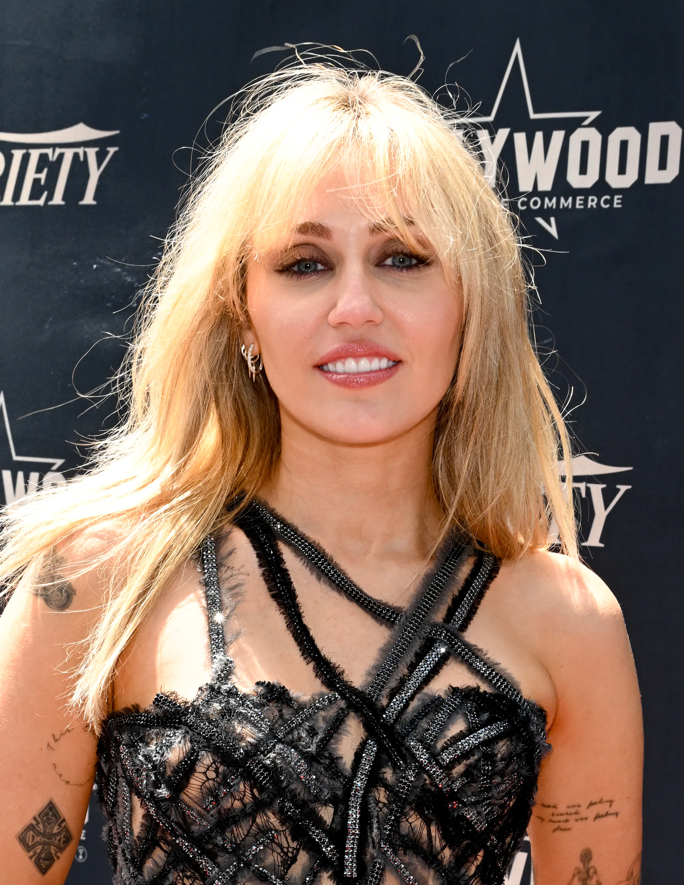 Miley Cyrus at her hollywood walk of fame star ceremony 