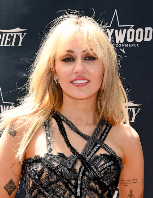 Miley Cyrus at her hollywood walk of fame star ceremony