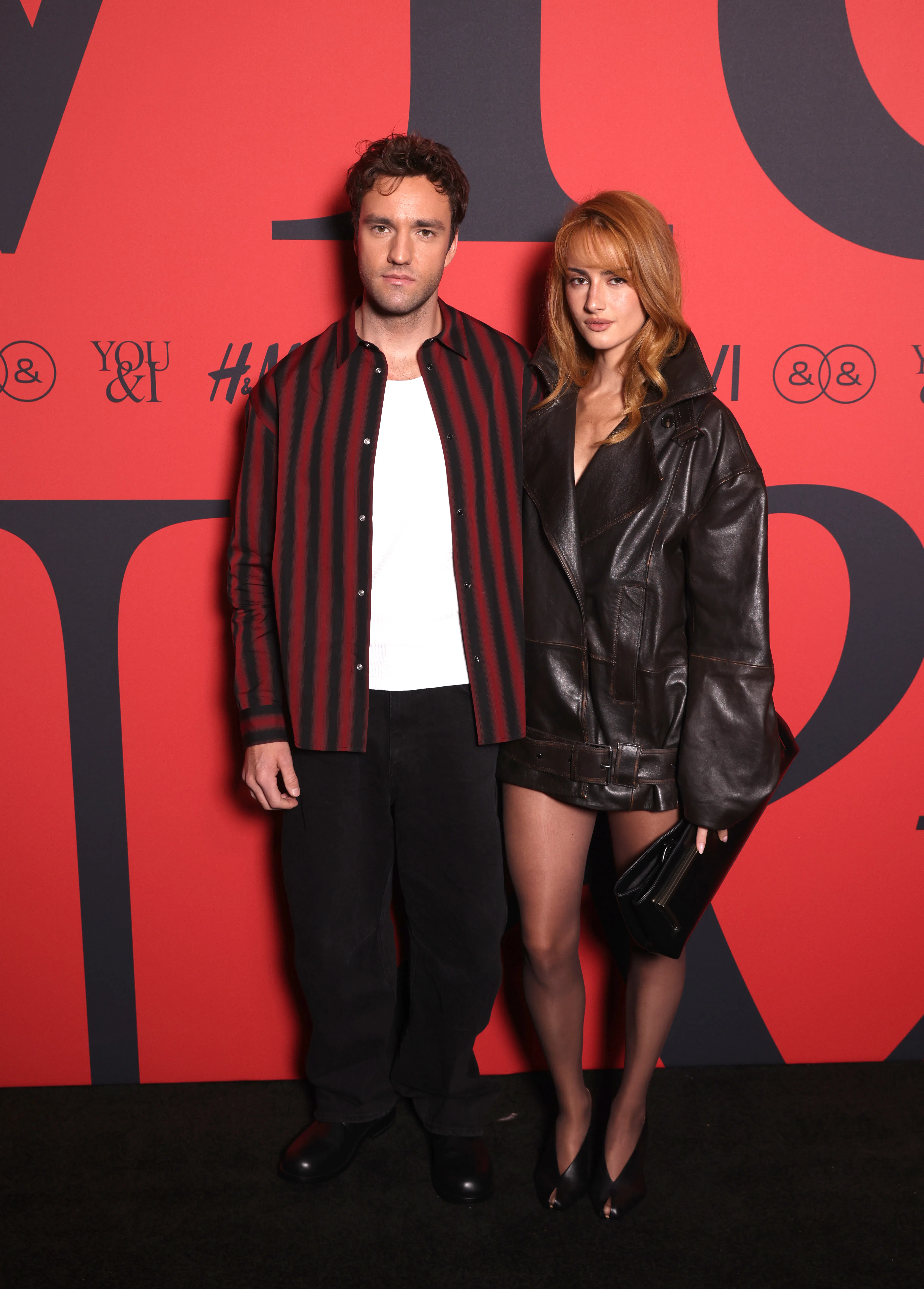 LONDON, ENGLAND - SEPTEMBER 17: Jackson White and Grace Van Patten attend the H&M show during London...