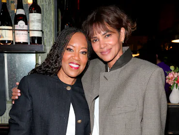 NEW YORK, NEW YORK - SEPTEMBER 22: (L-R) Regina King and Halle Berry attend the Through Her Lens: Th...
