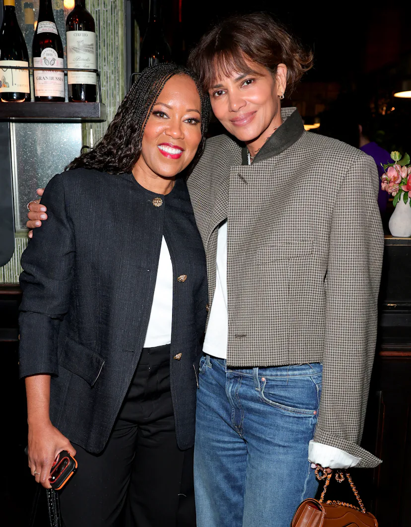 NEW YORK, NEW YORK - SEPTEMBER 22: (L-R) Regina King and Halle Berry attend the Through Her Lens: Th...