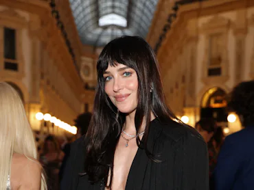 MILAN, ITALY - SEPTEMBER 22: Dakota Johnson attends Vogue World: Milano 2026 at Galleria Vittorio Em...