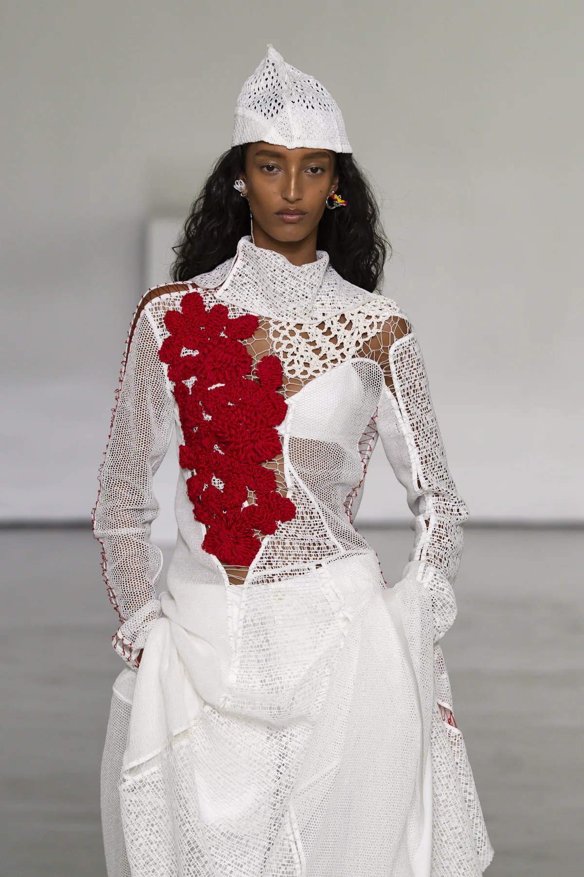 Milan's Quiet Whimsy: Playful Headwear Defines the Season