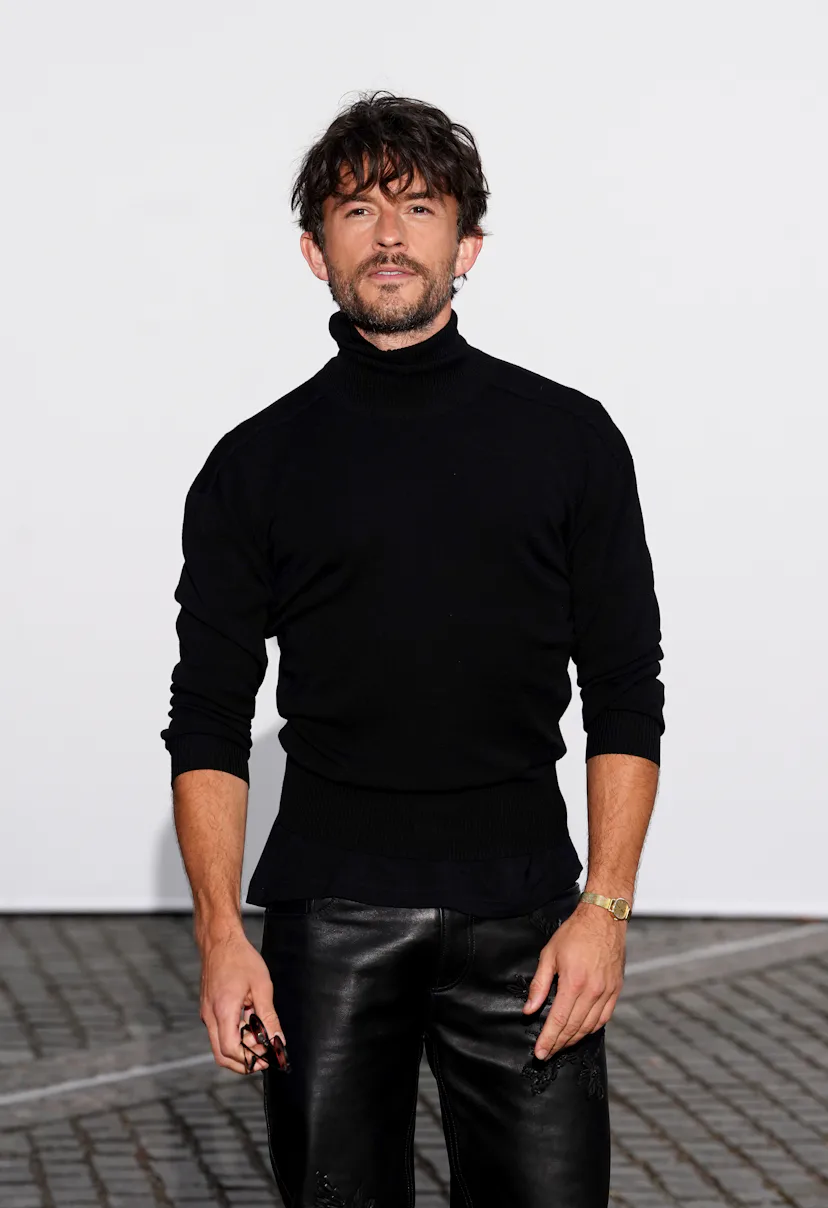 Jonathan Bailey attends the Burberry show at Chelsea College of Art, London, during London Fashion W...