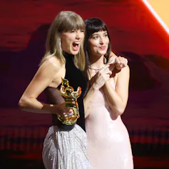 Taylor Swift and Dakota Johnson onstage as Swift accepts the Artist Director Honors at 2026 MTV Vide...