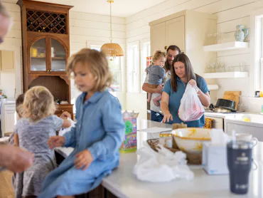 Multigenerational young family time in the kitchen
