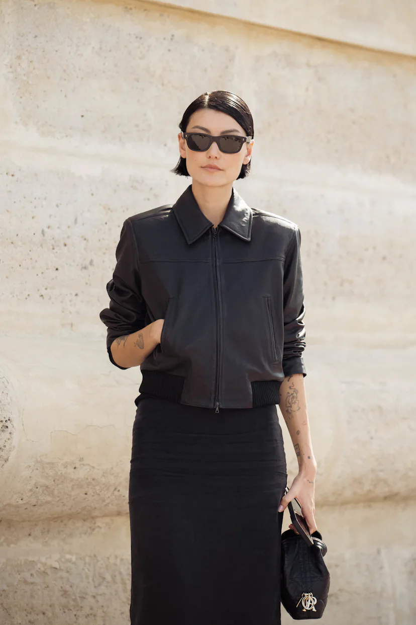 a guest with a glossy bixie haircut at paris fashion week s/s 27