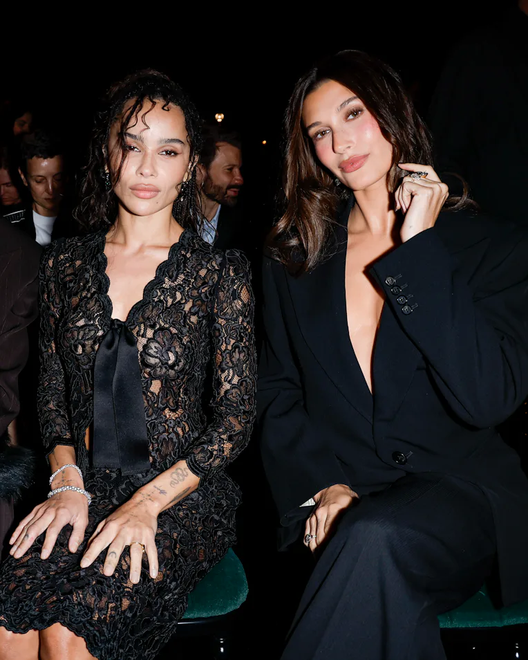 Zoe Kravitz and Hailey Bieber at the Saint Laurent fashion show as a part of Paris RTW Spring/Summer...