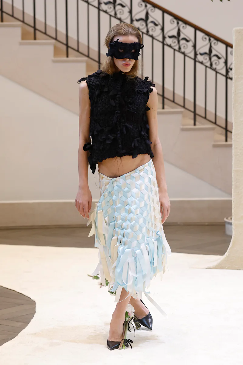 LONDON, ENGLAND - FEBRUARY 21: A model walks the runway at Thevxlley show during London Fashion Week...
