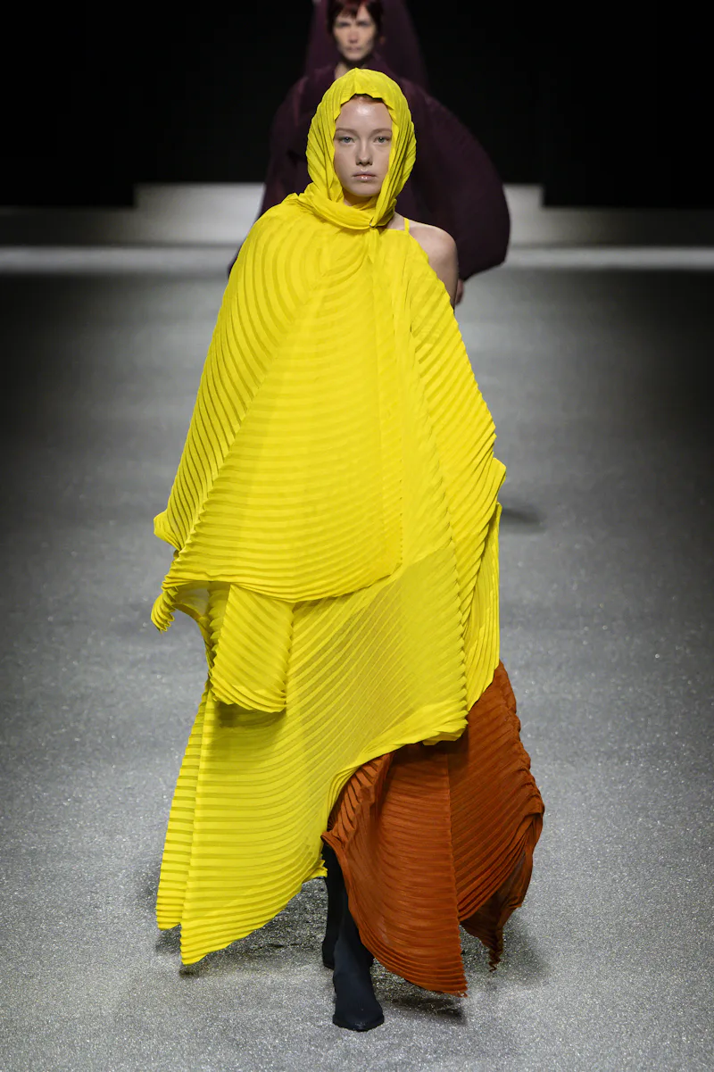 PARIS, FRANCE - MARCH 06: A model walks the runway during the Issey Miyake Ready to Wear Fall/Winter...