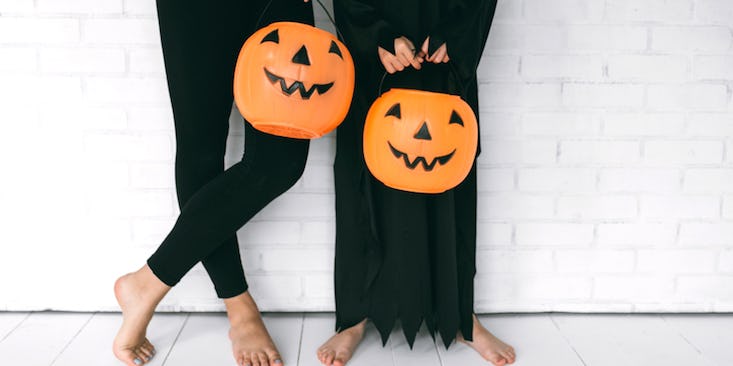 6 Yoga Poses For Halloween That'll Get You Into The Spooky Spirit