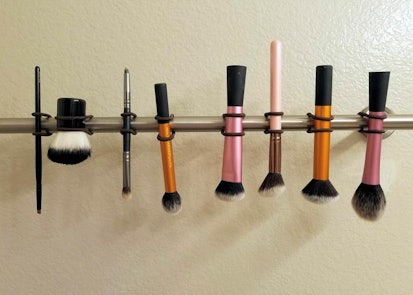 I wanted to share the makeup brush drying holder I made only using 4 i