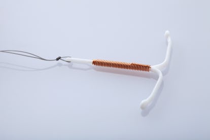 6 Signs You're Pregnant With An IUD, According To Experts