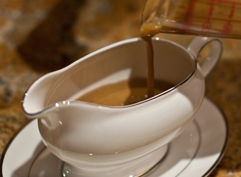 All-purpose gravy pouring in a gravy boat with saucer