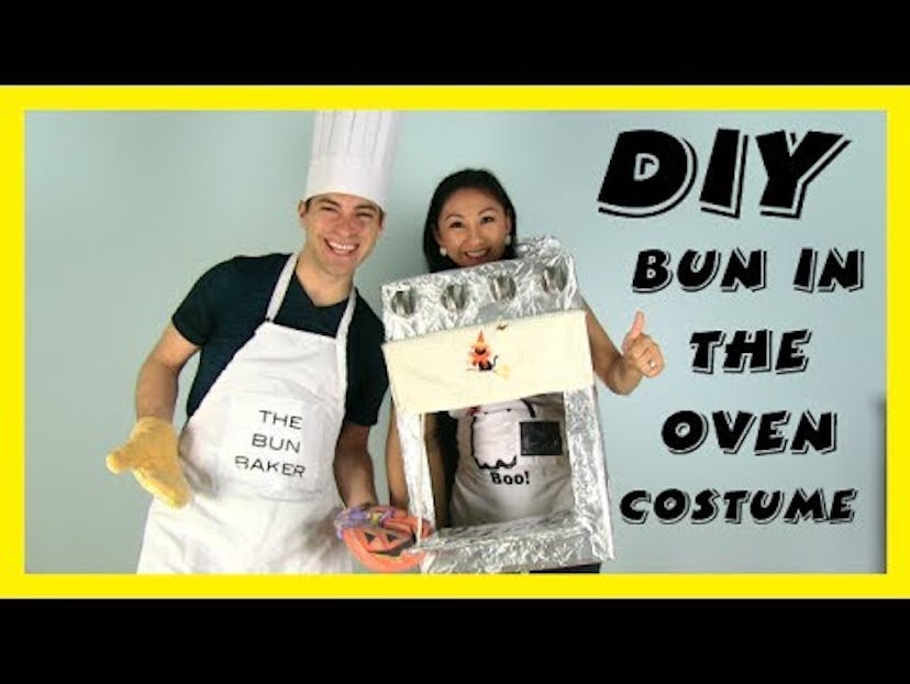 A man wearing a chef costume next to a woman in a DIY 'Bun in the oven' costume