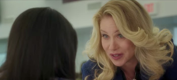 Christina Applegate looking angry while talking to another woman, turned with her back