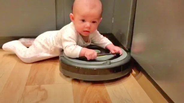 This Viral Video Of A Baby Riding A Roomba Is The Cutest & Most ...