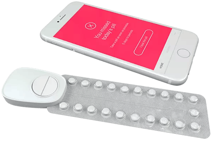 A mobile phone and a birth control pill package