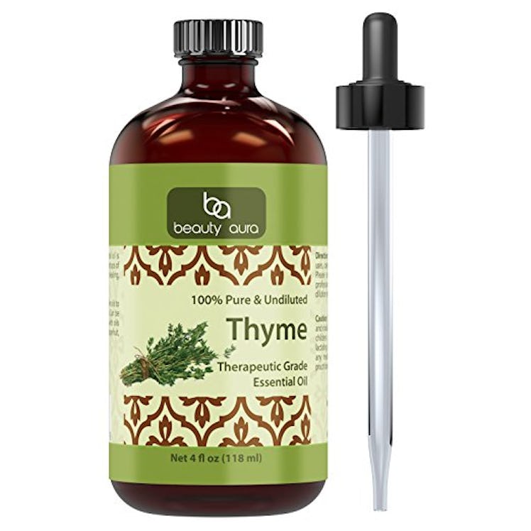 A bottle of Beauty Aura Thyme Essential Oil