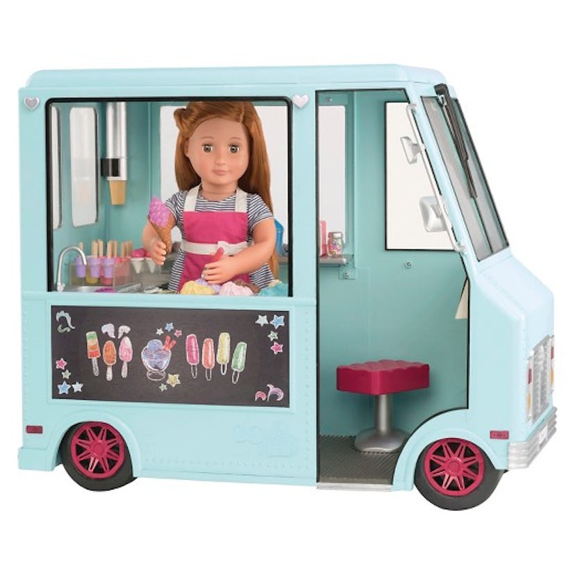 A female doll toy, standing in the light blue vehicle and selling ice cream