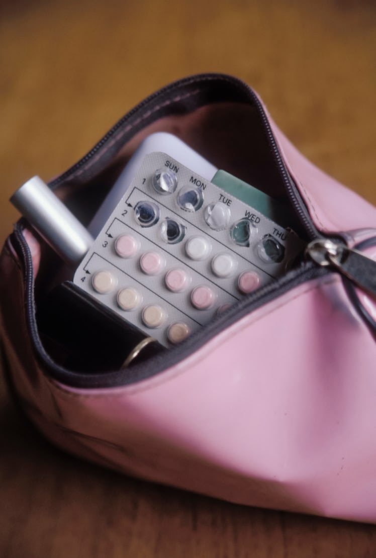 Birth control pills in a vanity case