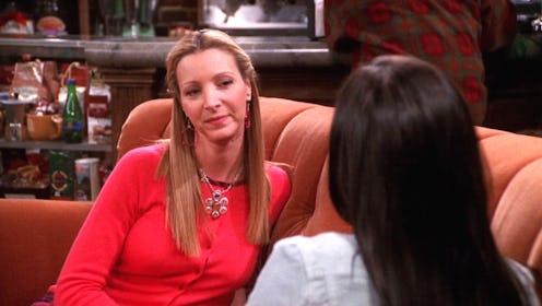 Phoebe Buffay sitting in Central Perk.