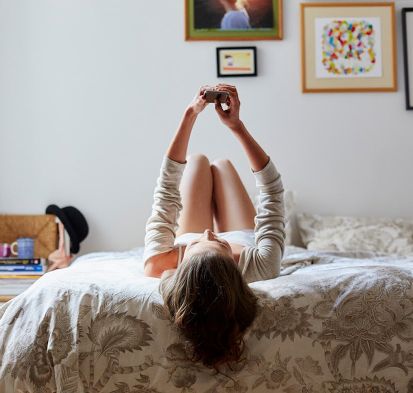 A woman decides what to text a guy the morning after.