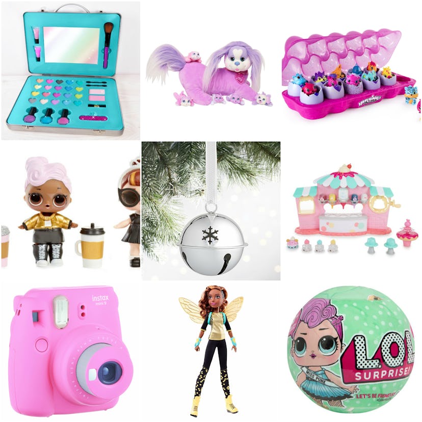 L.O.L. surprise toys box with a doll, dogg, camera, makeup, eggs and a house in it