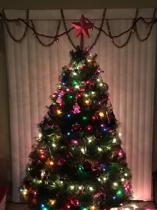 A beautifully decorated Christmas tree with a star on top of it