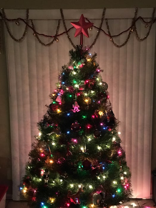 A beautifully decorated Christmas tree with a star on top of it
