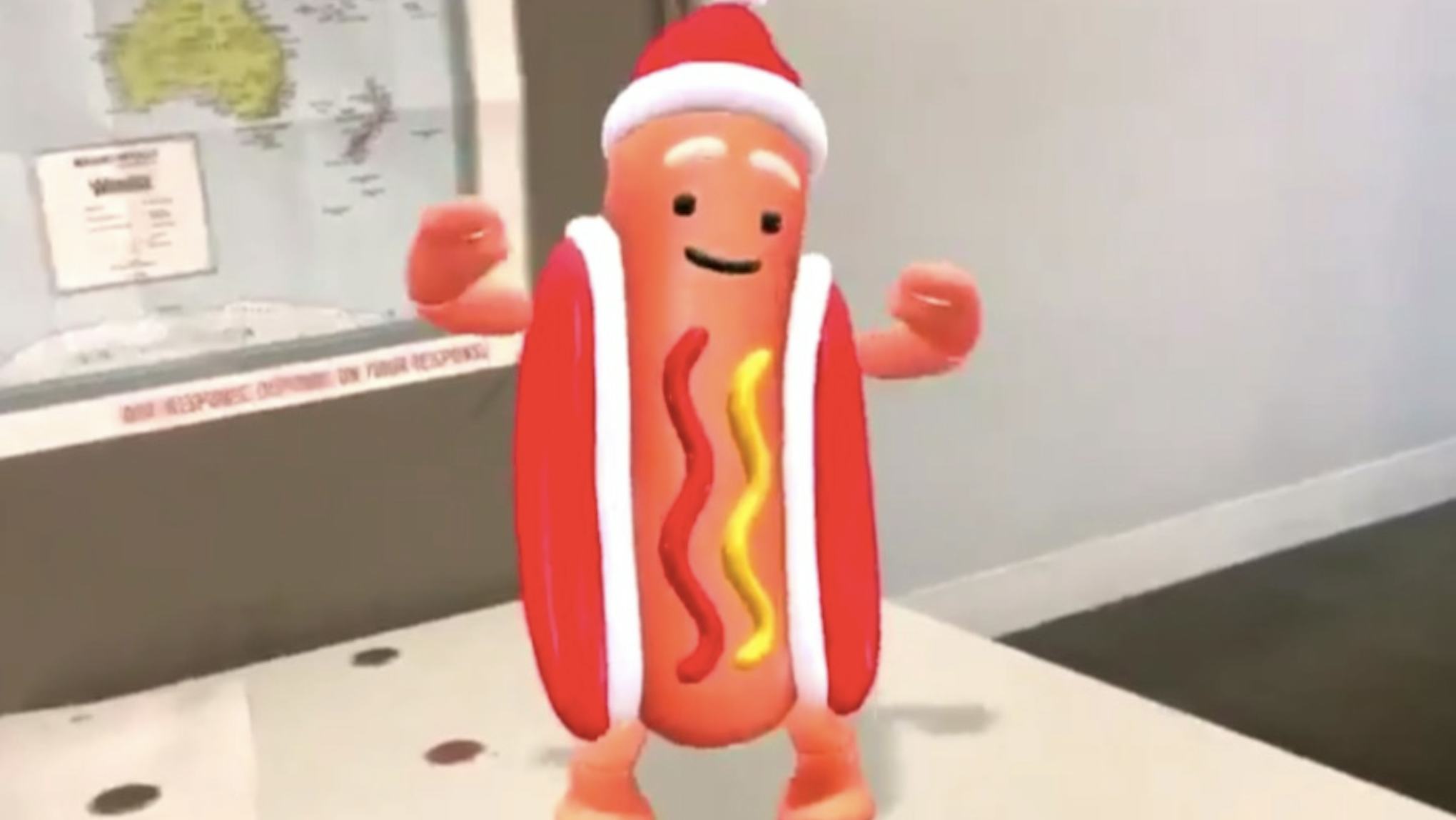 These Tweets About Snapchat's Christmas Dancing Hot Dog Will Put You