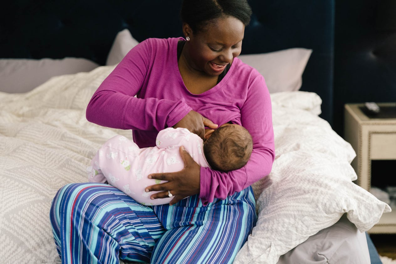 The 6 Best Breastfeeding Positions For Large Breasts