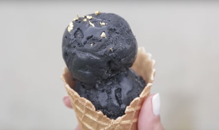 Charcoal ice cream in a cone.