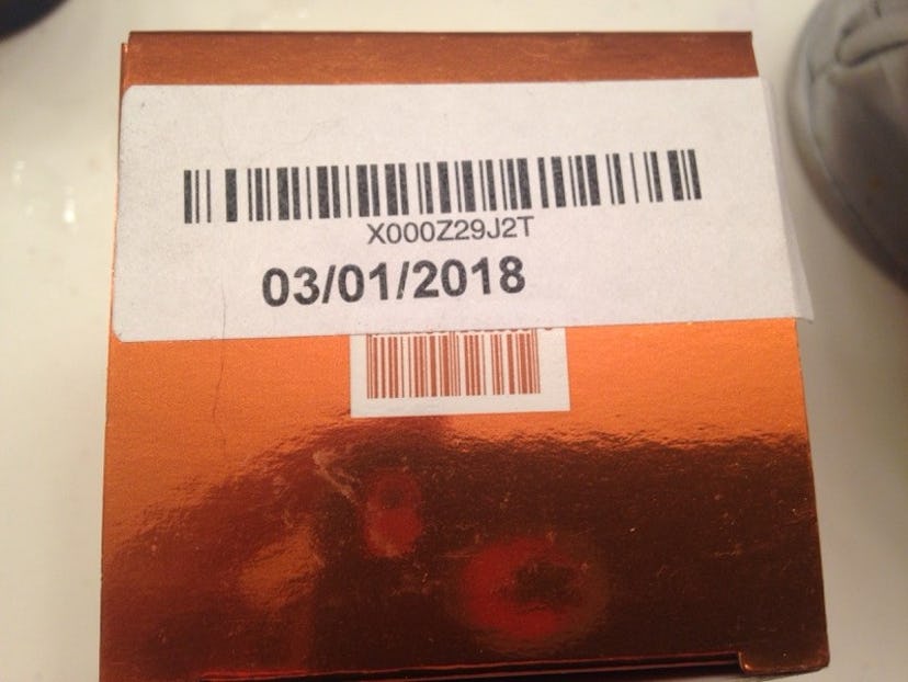 A picture of an expiration date at the bottom of the snail mucus packaging.