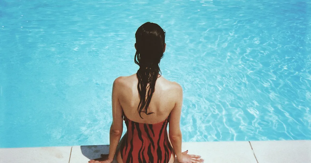 Woman Is Asked To 'Cover Up' Inappropriate Swimsuit Poolside, & It