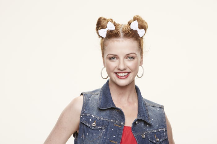 Raven from Big Brother 19 with space buns and white bows in her hair