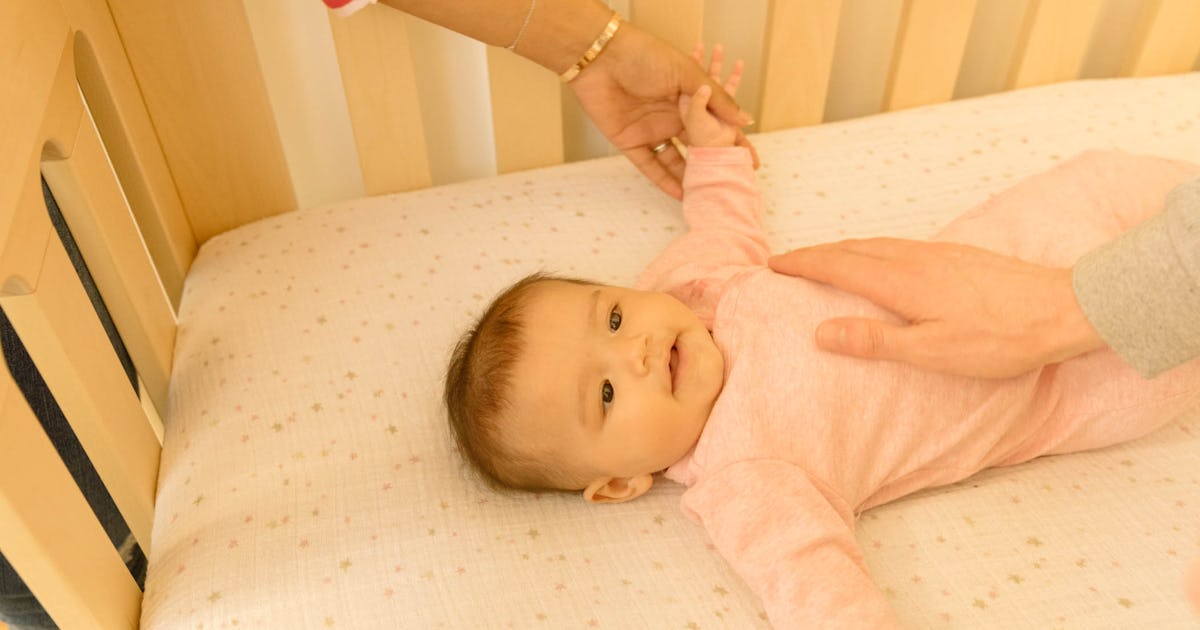 How To Keep Your Baby From Sticking Their Arms Legs Through The Crib Bars How To Keep Your Baby From Sticking Their Arms Legs Through The Crib Bars