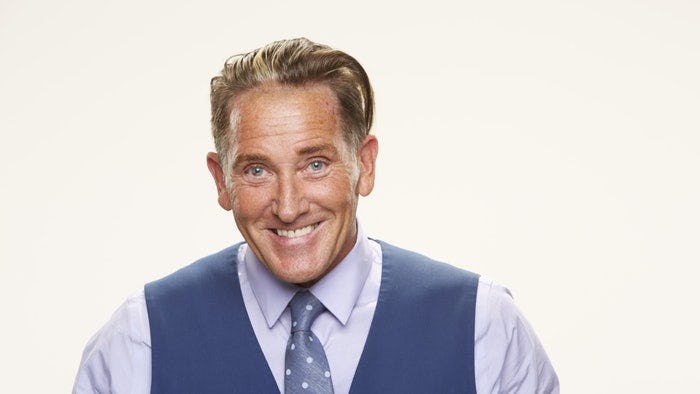 Kevin Schlehuber smiling and posing for a photo