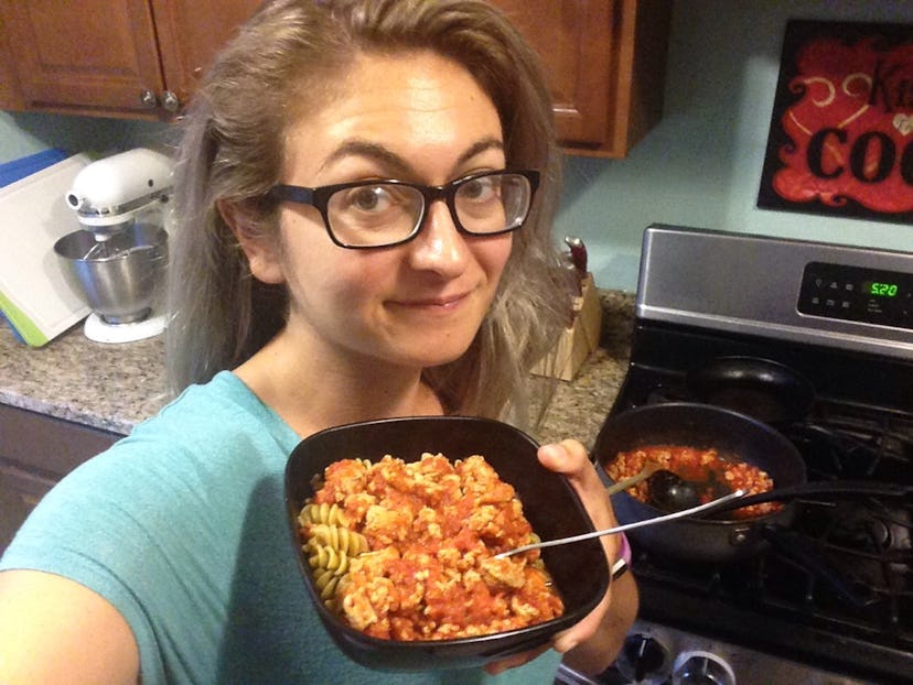 Girl showing the dinner she prepared for her partner and kids
