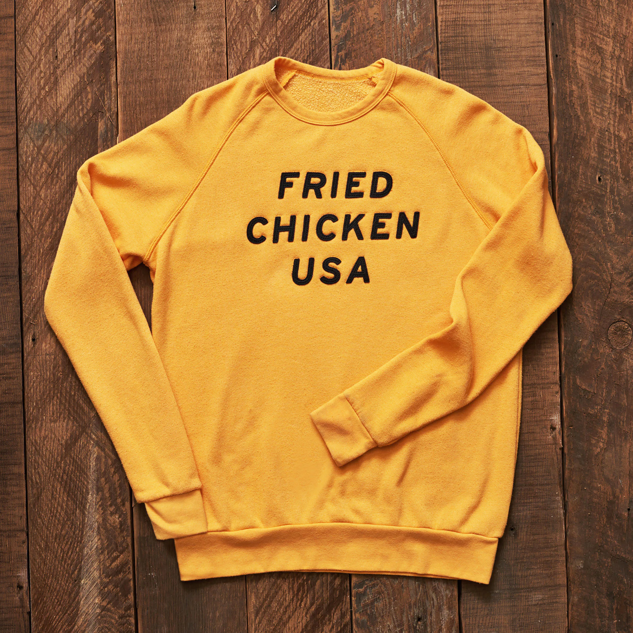 KFC Has Merch Now, So You Can Eat Your Chicken & Wear It Too