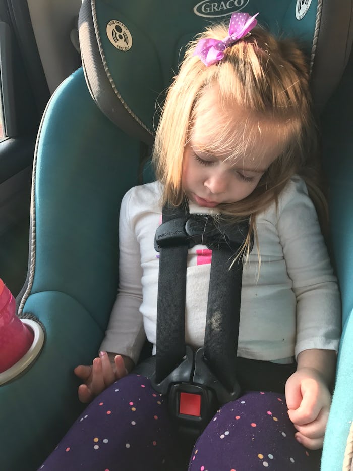 Sleeping child with the car seat head flop.
