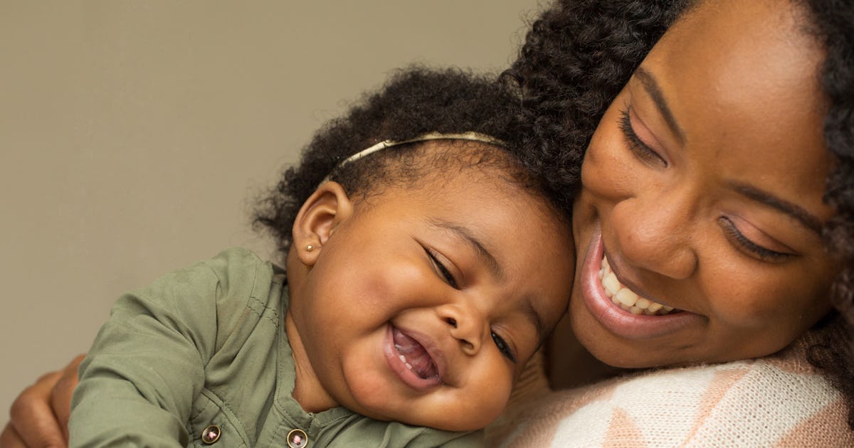 How Cuddling With Your Baby Affects Your Brain, According To Science
